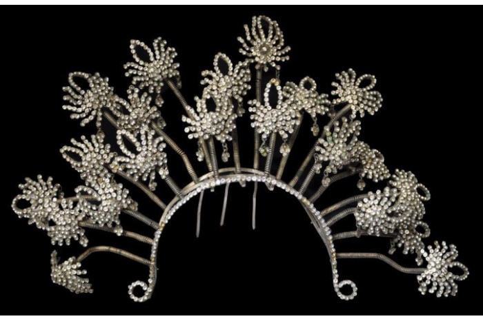 <span><a href="/assets/7e7e26a4-c2ad-4010-b7c7-8a5b94450a16/Bridal Headdress.jpg">Bridal headdress with <em>entremble</em> diamante filaments</a></span>